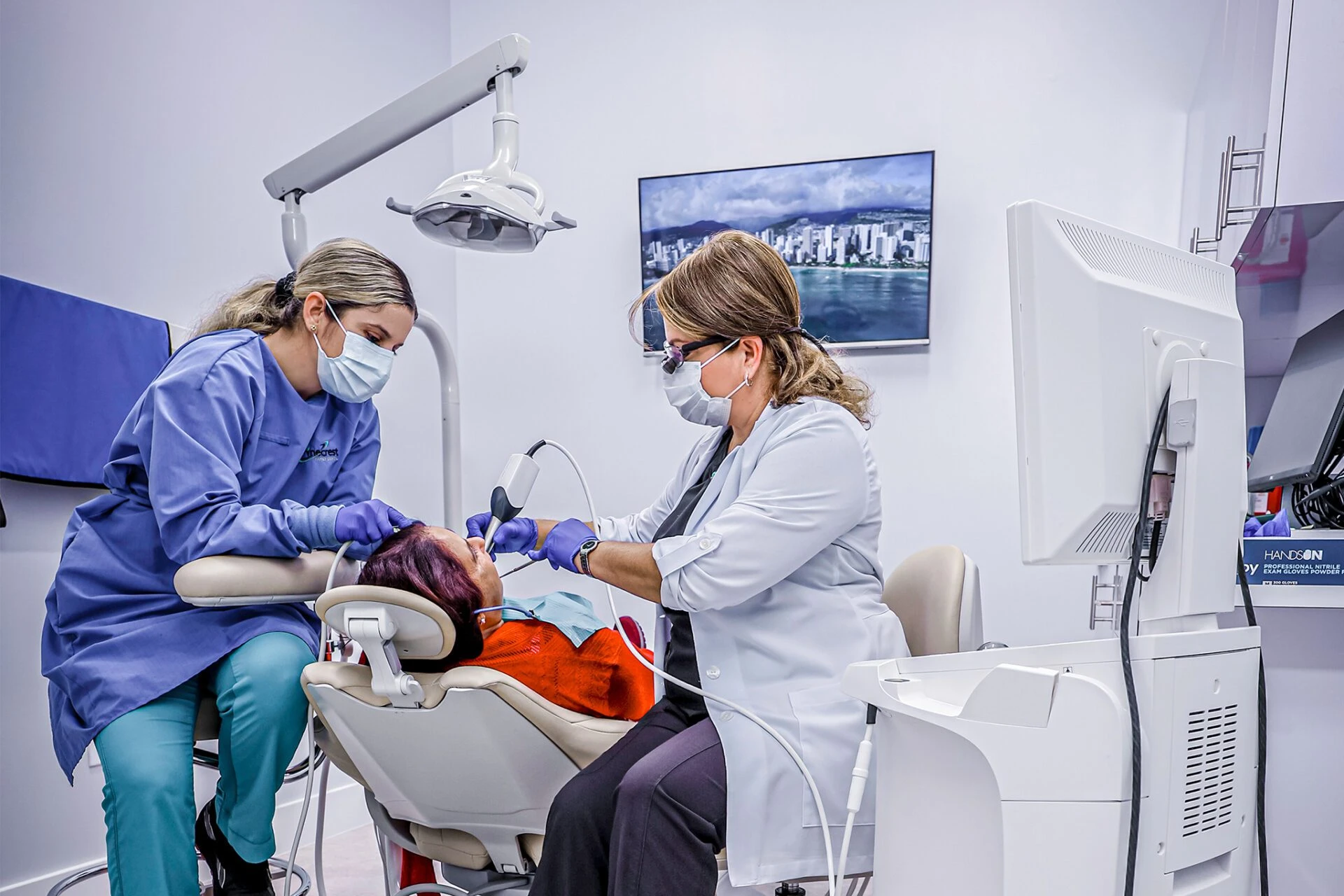 Dentist checking patient and providing dental services